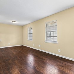wood floor living room at the Oakley apartment homes in Tuscaloosa, AL